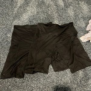 two pairs of never worn black biker shorts!